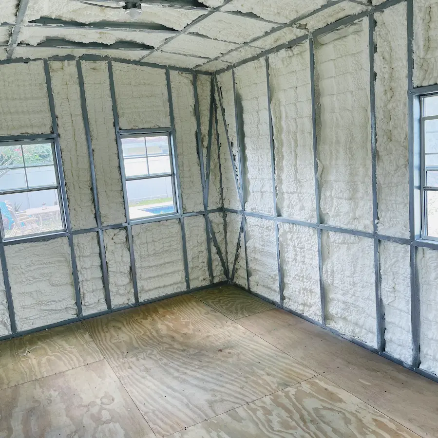 Closed-cell spray foam insulation applied to wall cavities in a residential project in Oronoko