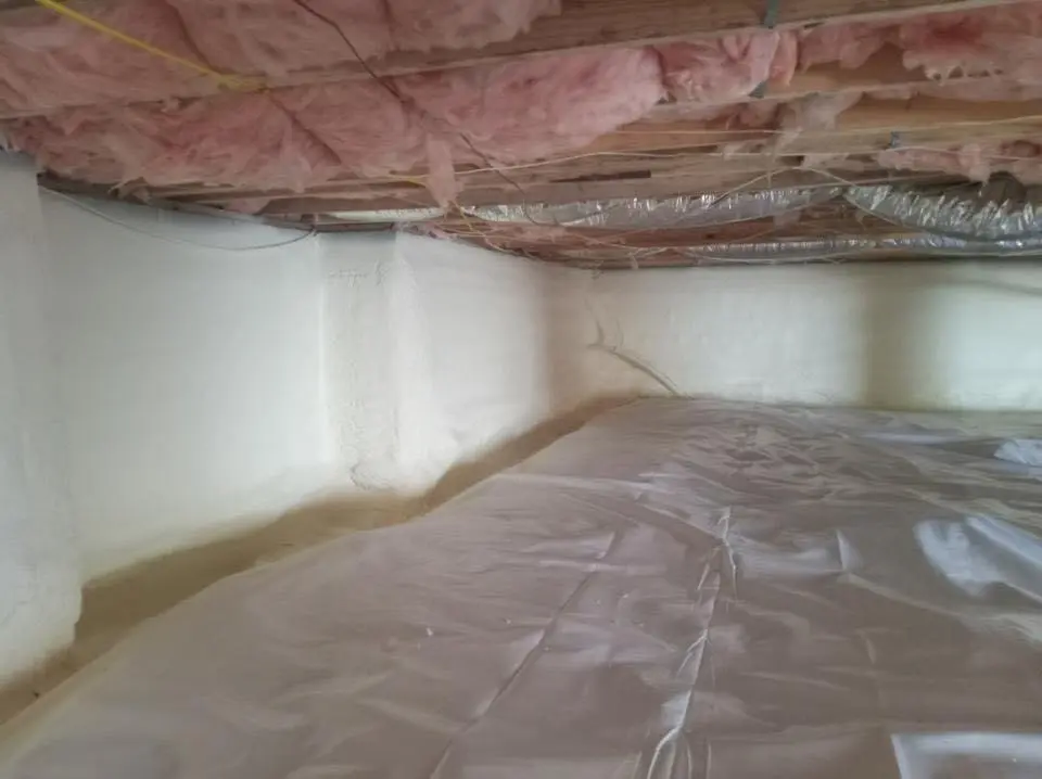 Crawl space encapsulation with closed-cell spray foam for Commercial Roof Restoration in Oronoko